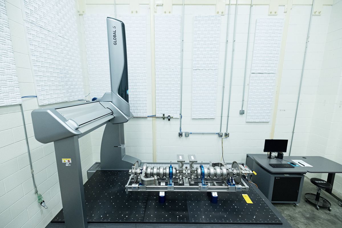 Bridge-style coordinate measuring machine set up for a long precision part