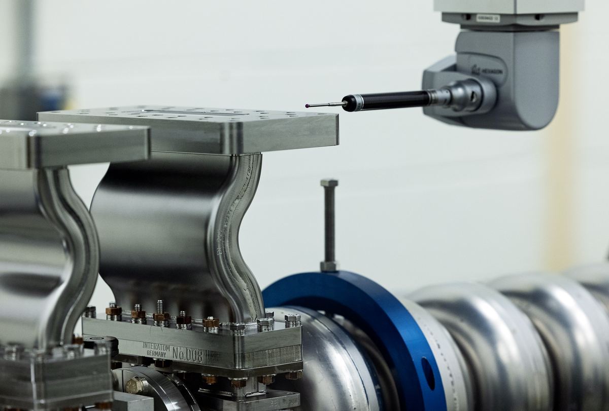 CMM probe measuring a fixtured precision part